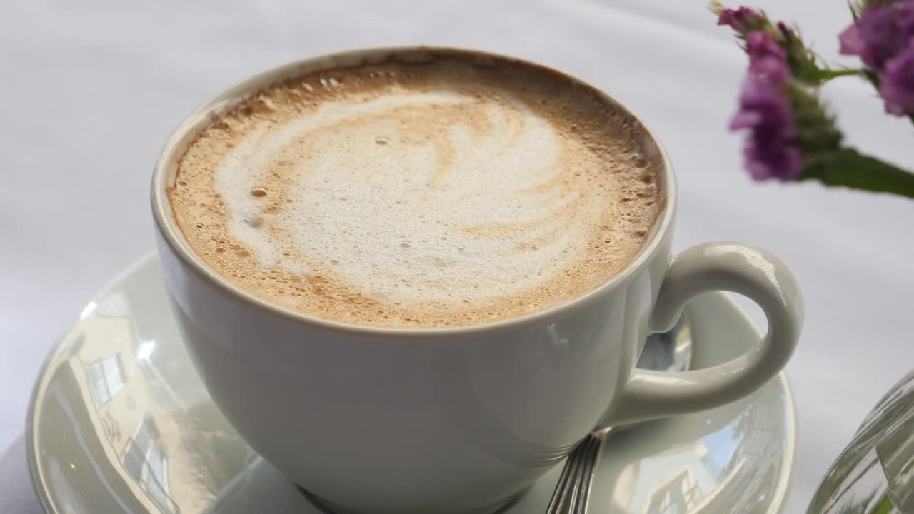Cup of Cappuccino with Flowers