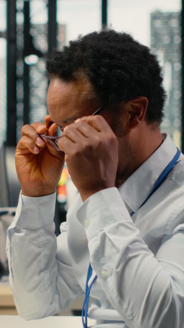 Vertical video Computer scientist working in AI startup trains predictive models