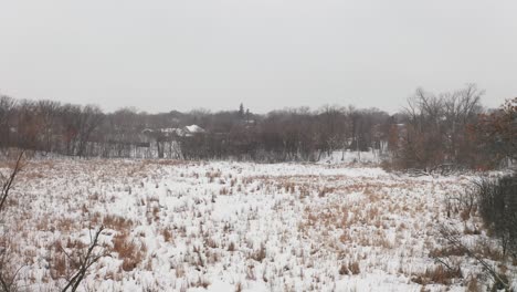 Aerial-view-of-a-frozen-marsh-in-Minnesota,-USA