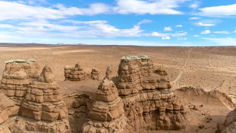 beautiful aerial footage of canyons full of red rocks in utah