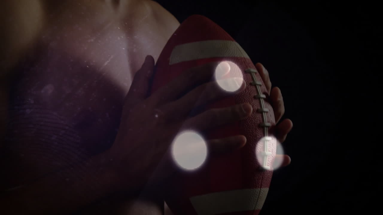 man holding football with animated performance stats overlay boosting sports tech presentation