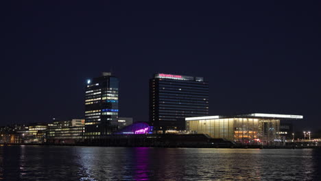 Night-View-Of-Movenpick-Luxury-Hotel-In-Amsterdam-City-Center-In-North-Holland,-Netherlands,-Europe