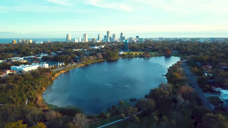 4k aerial slow tracking video of downtown st petersburg from crescent lake park