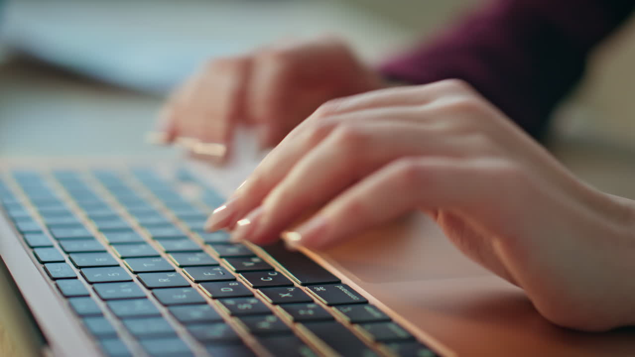 Closeup freelancer typing laptop at desk. Woman hands browsing internet online