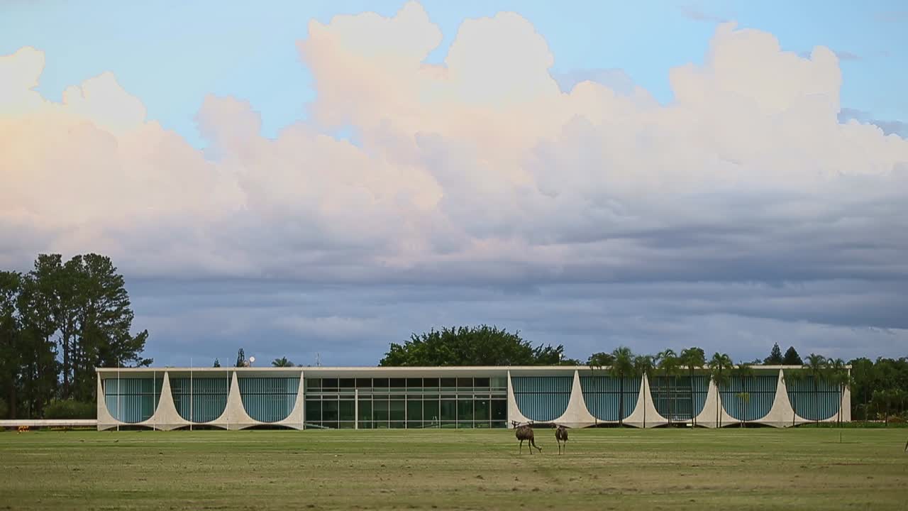 Alvorada Palace, the Brazil's president official house. Exterior wide view. Frontal field with some ema birds.