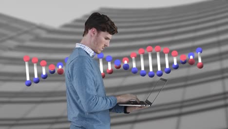 Animation-of-caucasian-businessman-using-laptop-over-dna-strand-spinning