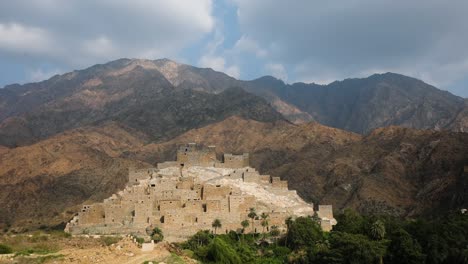 Wide-shot-of-Thee-Ain-village-landscape-in-Saudi-Arabia-with-mountain-background,-establishing