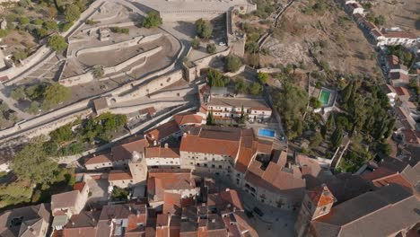 orbiting overhead aerial view of historic medieval village of trujillo, extremadura, spain