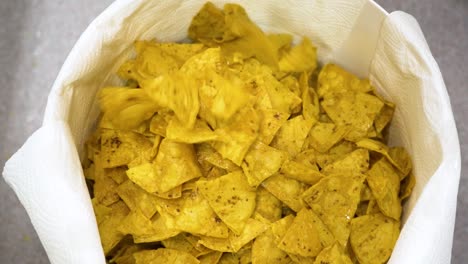 tortilla chips falling in slow motion, food video, great quality nacho crisps