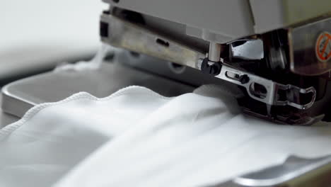 close up on a sewing machine showing process