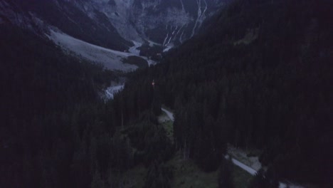 aerial view of alpine campsite at dusk