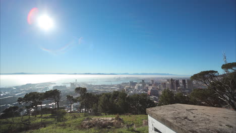 a motion time lapse with views of cape town centre and low rolling clouds and fog moving in the early morning