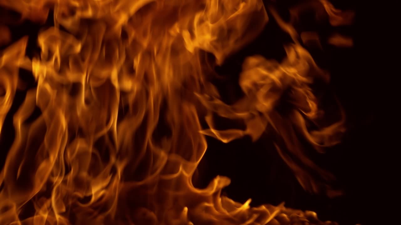 Flames of fire on black background in slow motion
