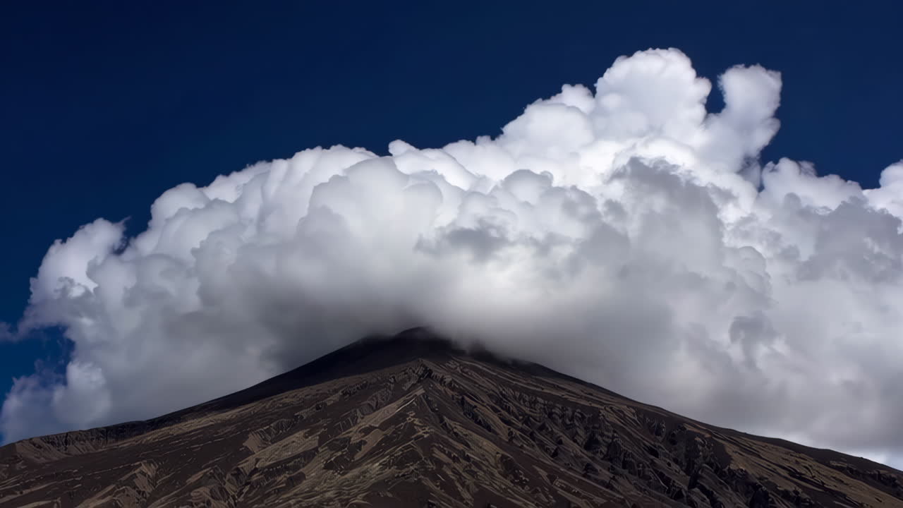 Volcano and Cumulus Clouds