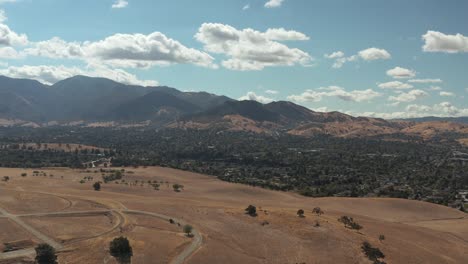 aerial shot of california countryside with hills with perfect blue skies and clouds, concord ca