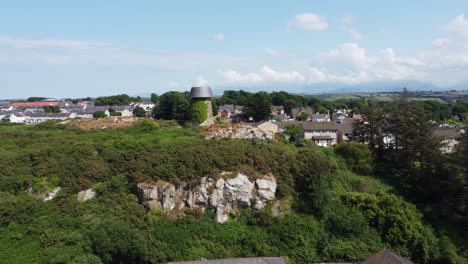 melin wynt y craig disused llangefni windmill establishing aerial view ivy covered hillside landmark