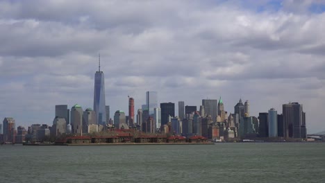 an extreme wide angle of new york city with clouds overhead