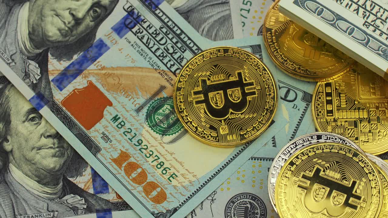 Bitcoins and US Dollar Bills