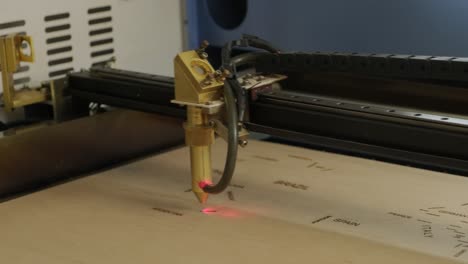 cnc laser cutting machine cuts wooden plank and plywood