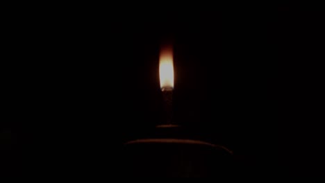 olden days candle lamp burning in the poor family house.