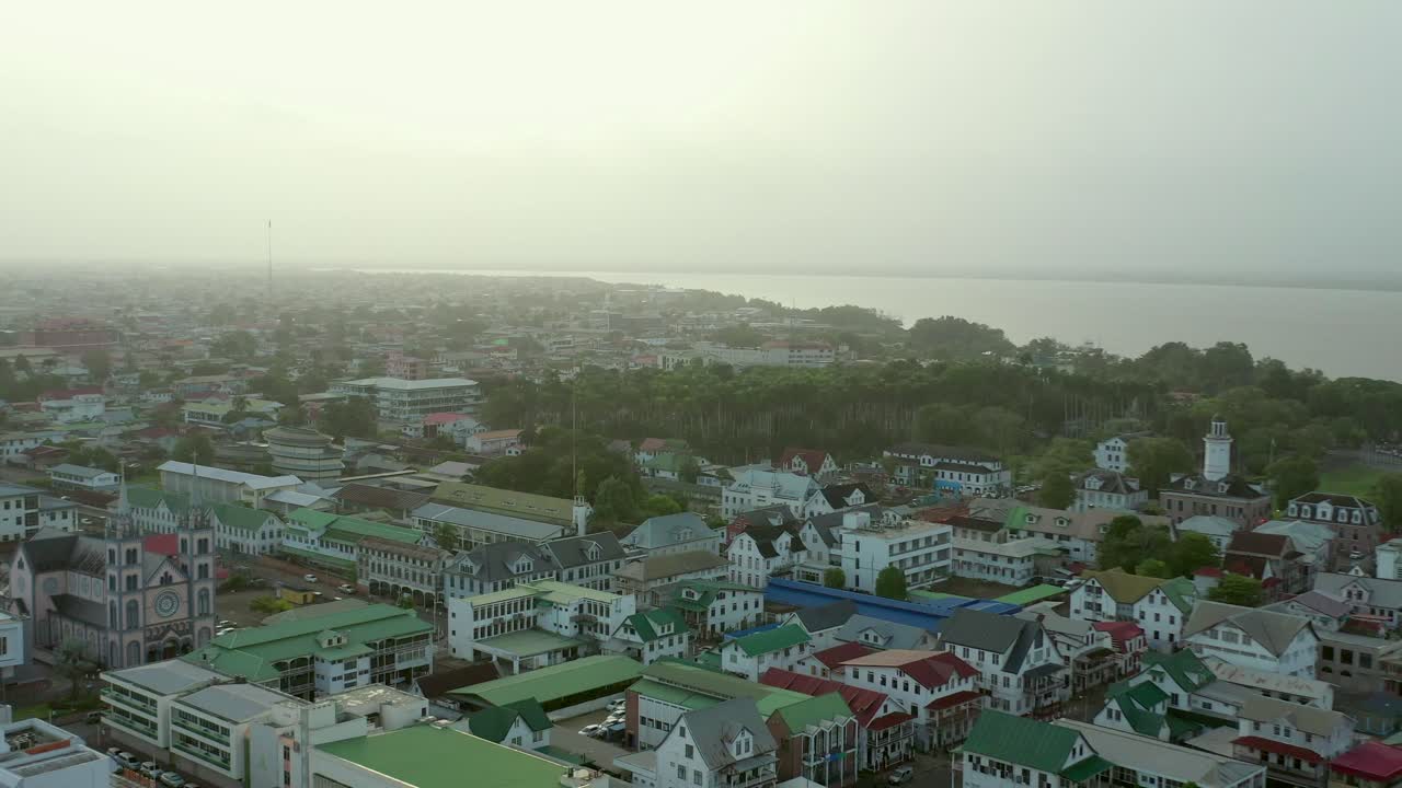 Aerial: beautiful Paramaribo city, capital of Suriname at sunset