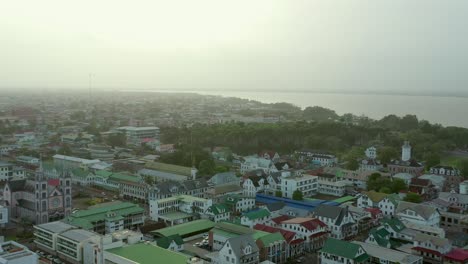 aerial: beautiful paramaribo city, capital of suriname at sunset