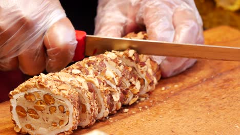 slicing a traditional spanish turrón