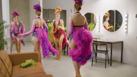 Three-Showgirls-Dancing-In-The-Backstage