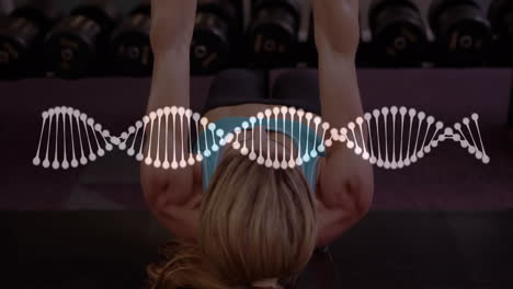 animation der dna-strangspinnung und datenverarbeitung über eine starke frau, die trainiert