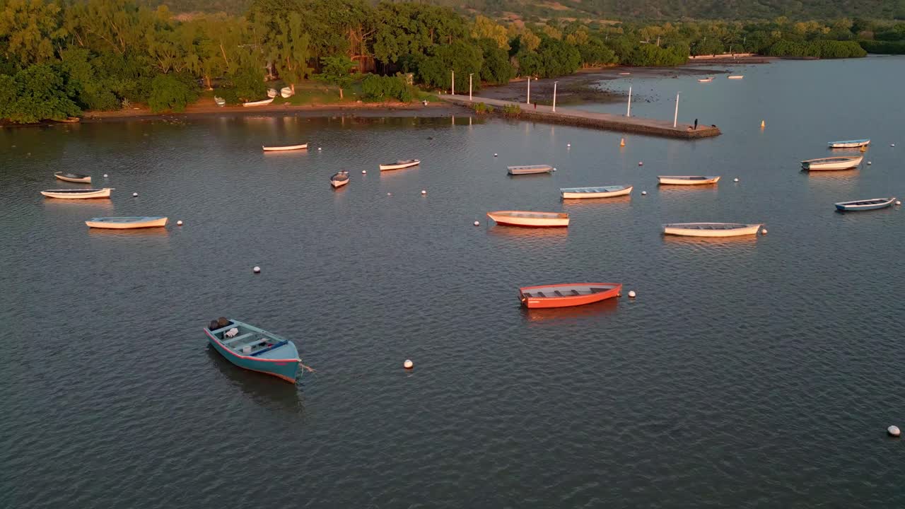 Mauritius - Case Noyale - Golden hour low altitude forward view on the fishing boats