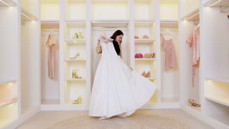 caucasian woman in wedding dress shop