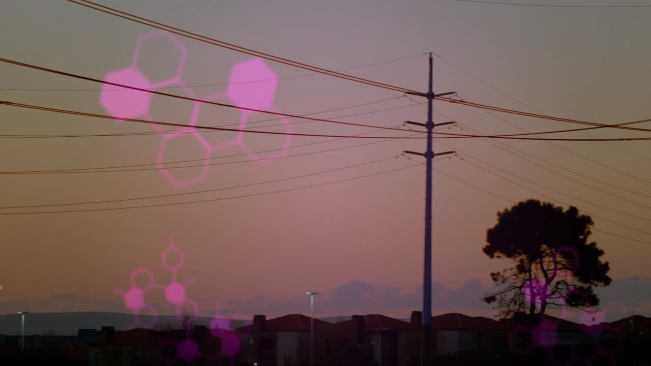 Steel lattice power tower rising dusky skyline, showcasing magenta digital overlays