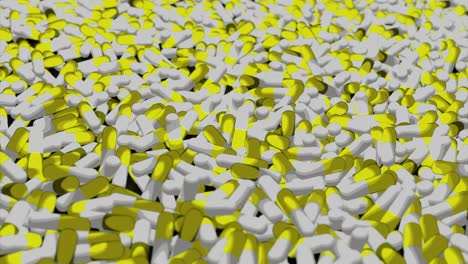 close-up of a large pile of yellow and white capsules