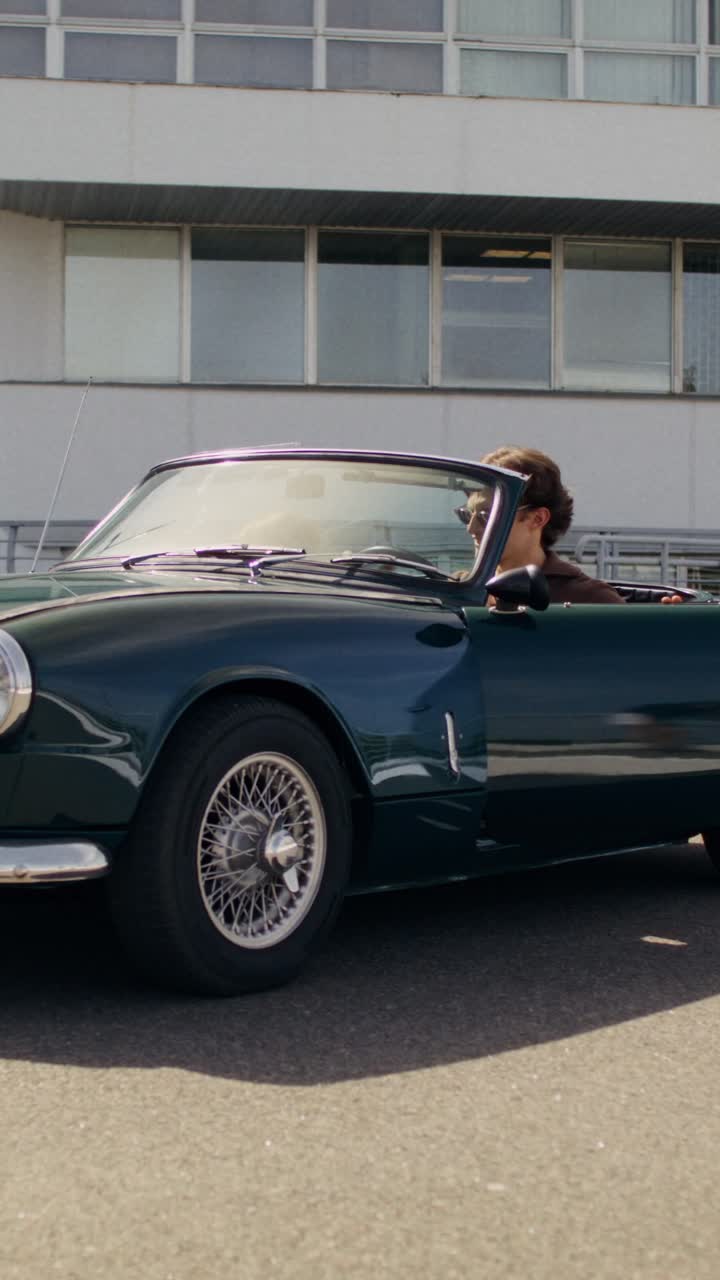 Couple with Vintage Convertible Car
