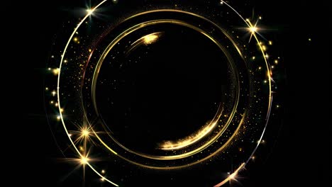 A top-down video view of a glowing, golden circular pattern with sparkling stars on a black