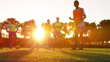 female soccer player shooting the ball 4k