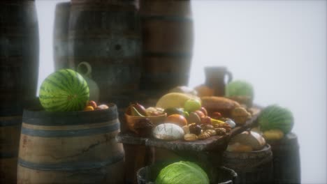 food table with wine barrels and some fruits, vegetables and bread