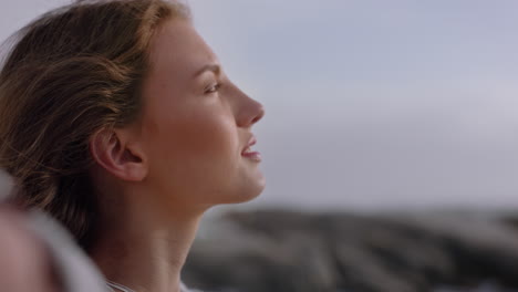 close up portrait beautiful woman smiling enjoying beach relaxing on seaside wind blowing hair exploring peaceful carefree lifestyle