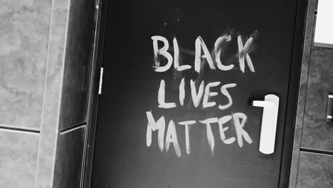 black lives matter message on a door
