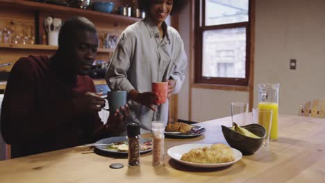 couple having breakfast at home