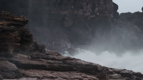 wild nature. big ocean waves crash on rocks