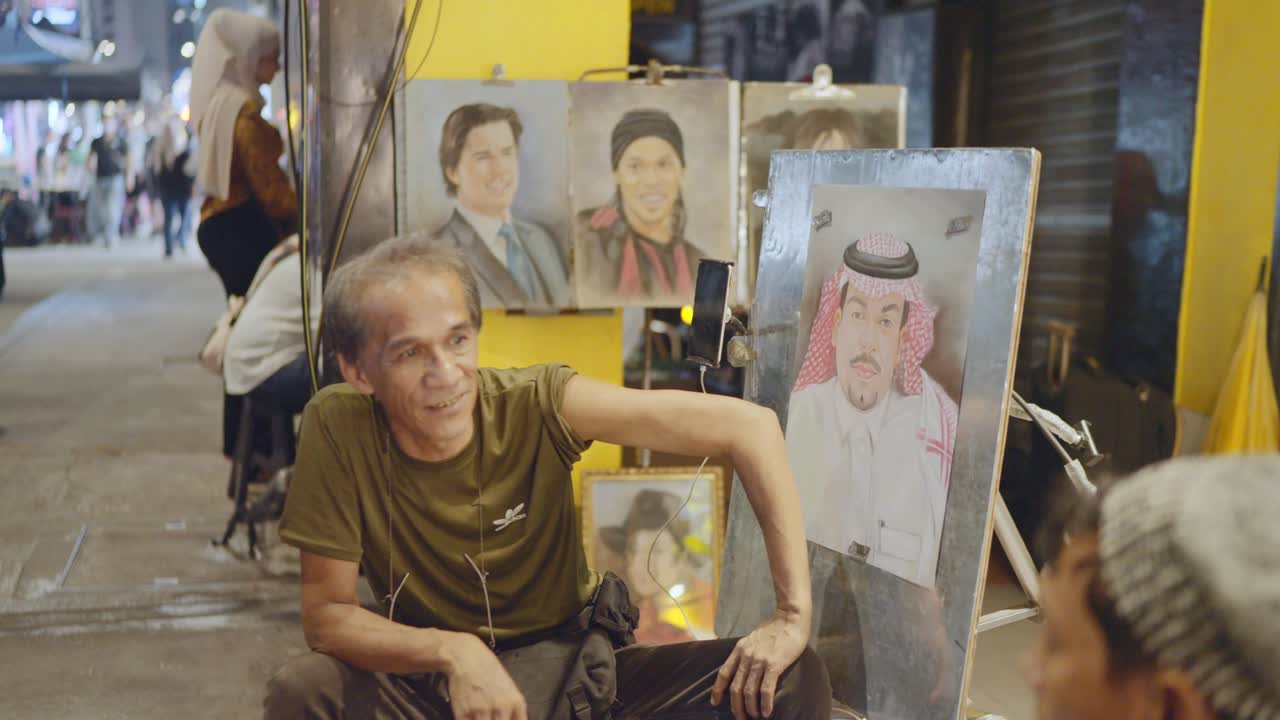 Artists on streets of Kuala Lumpur, Malaysia.