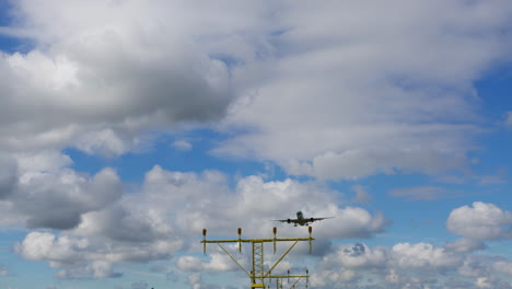 airplane landing on a cloudy day