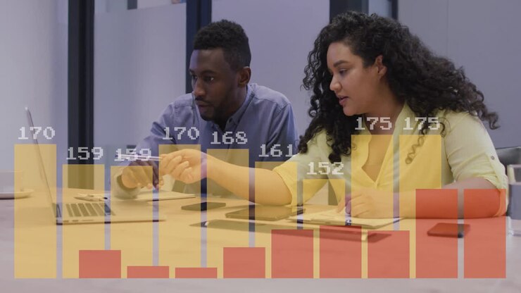 Animation of financial data processing over diverse colleagues discussing work in office