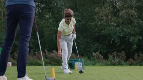 a woman playing golf