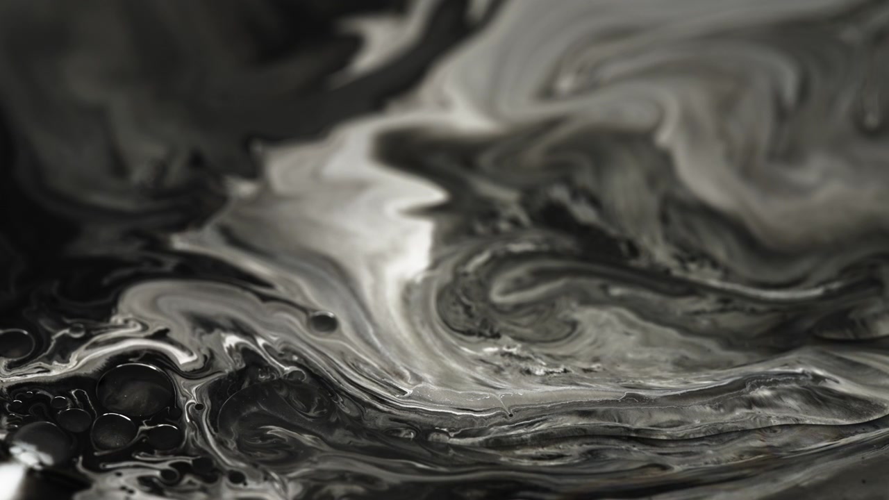 Cores líquidas abstratas em preto e branco.