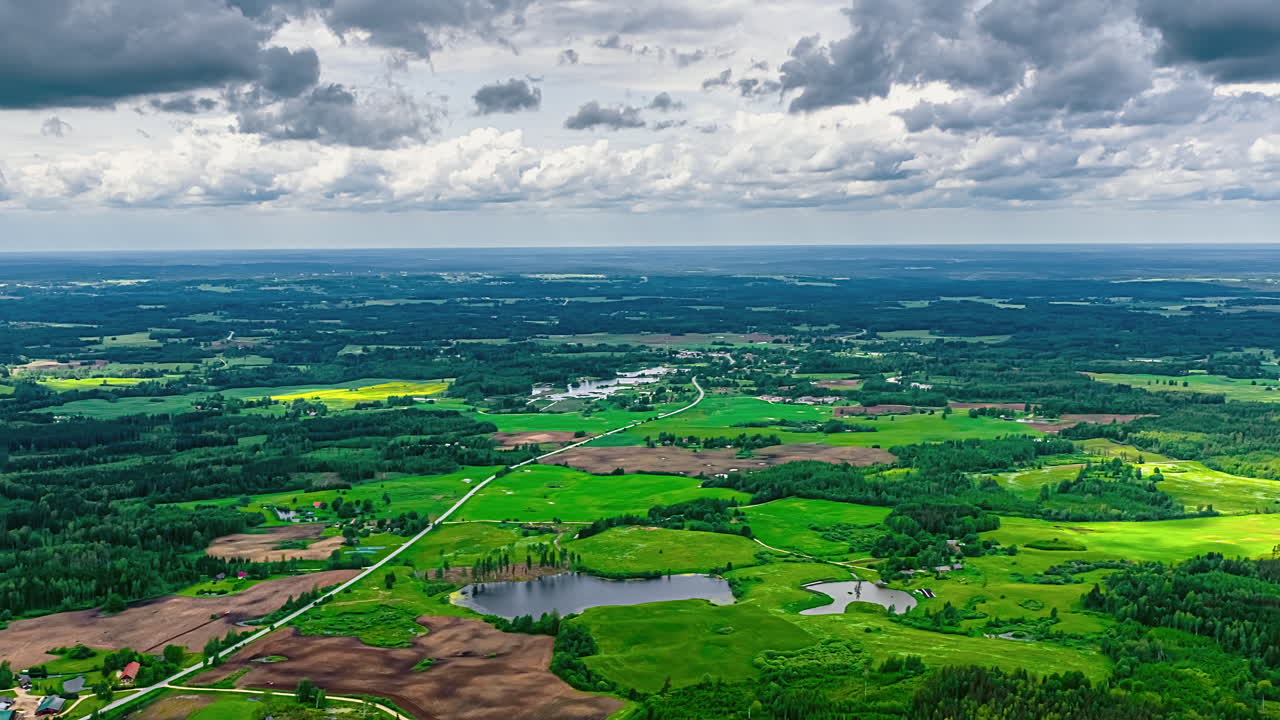 Timelapse moving rain clouds Cumulonimbus skyline hyperlapse aerial drone rural countryside