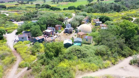 Aerial-Of-Storage-Sheds-Converted-Into-Homeless-Encampments-In-The-River-Bed-Area-Of-Ventura-Oxnard-California-2