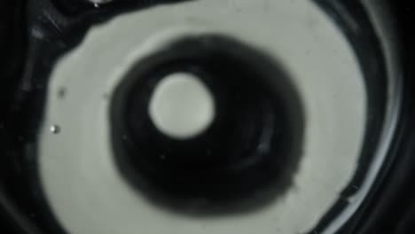 White Powder in Liquid under Microscope