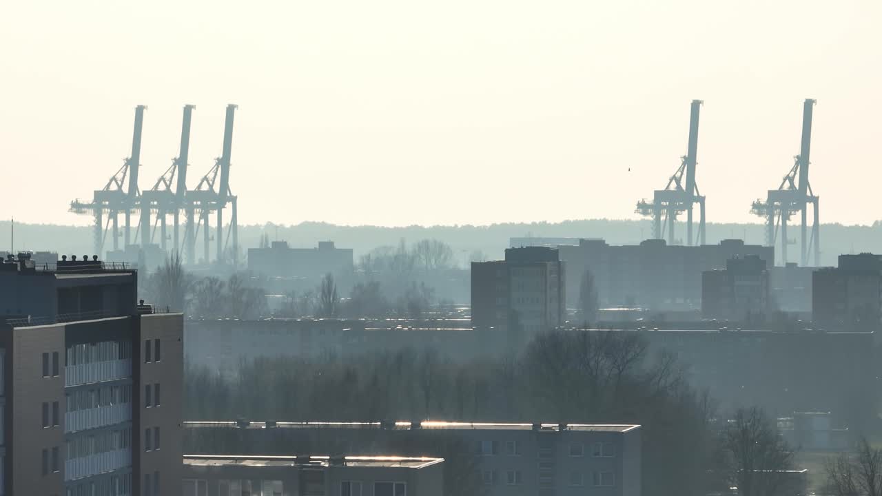 An aerial view of the city shows smog rising in the dry weather. Balric states, Klaipeda, Lithuania.
